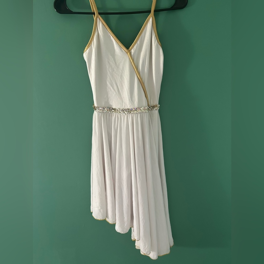 White and gold dance costume